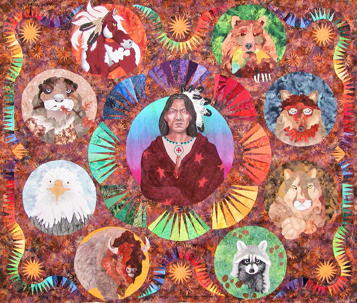 Force of nature is a huge work of fiber art with circles illustrating animals
 that an indian would have seen in his time centered around an Indian Brave.  This was a juried finalist at both the 
 Houston Internationsl Quilt Festival in
 2009 and the American Quilters Association Quilt Show Paducah in 2010.
