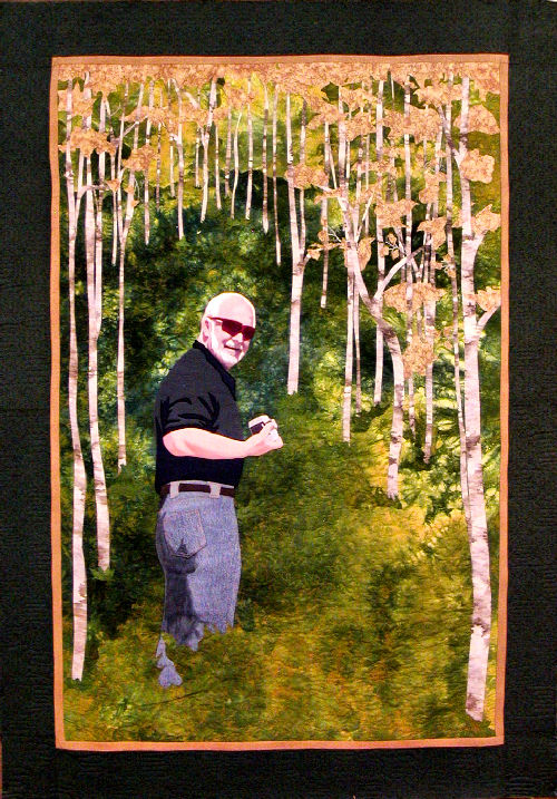 Searching For Aspen is a fiber art work that is a remembrance of
a trip to Colorado in the fall timed to catch the Aspen just as they were turning yellow and gave a brilliant contrast to the 
evergreen pine trees